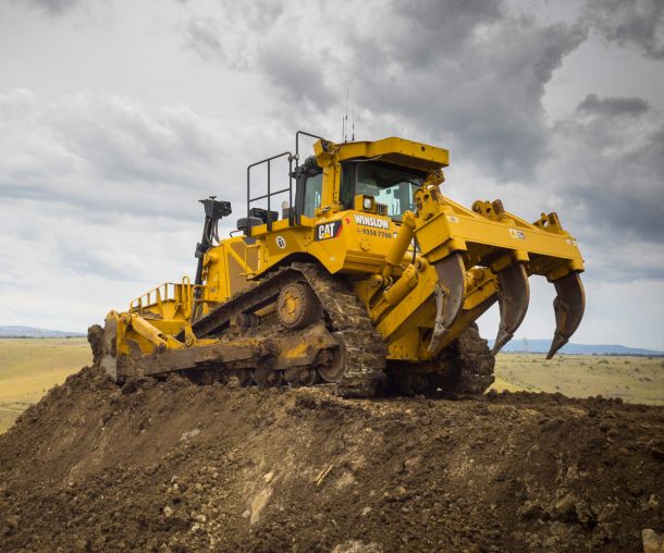 Dozer removing soil looking over the valley